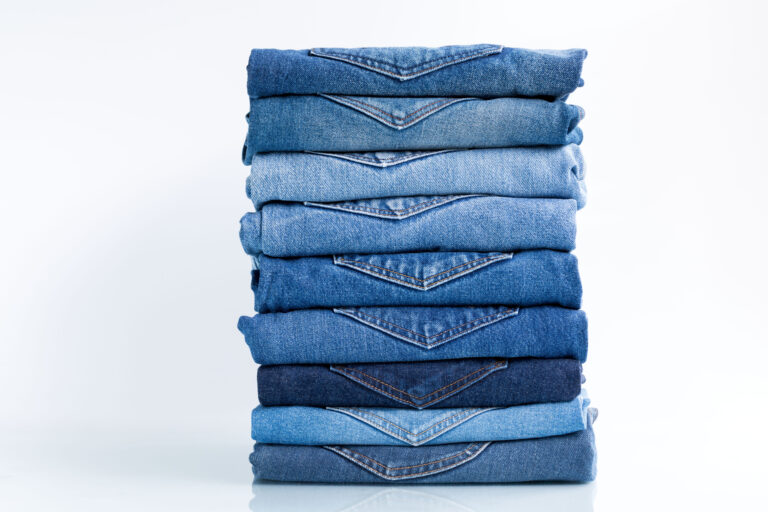 Jeans,Trousers,Stack,On,A,White,Background,Concept,Jeans,In